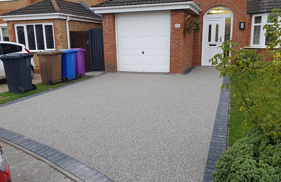 Resin surfacing work carried out in Kilwinning. UV resin Daltex Silver stone used with charcoal edging.